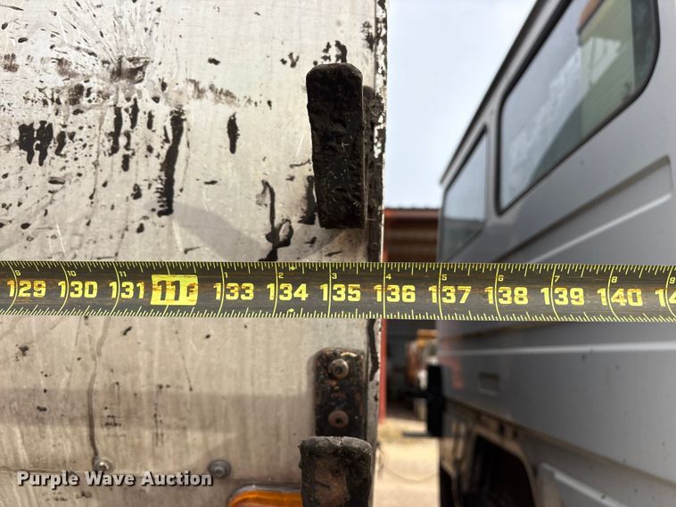 image for item ET7487 1999 Freightliner FL70 oil distributor truck