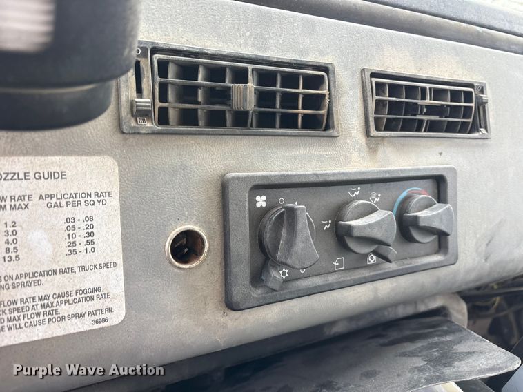 image for item ET7487 1999 Freightliner FL70 oil distributor truck