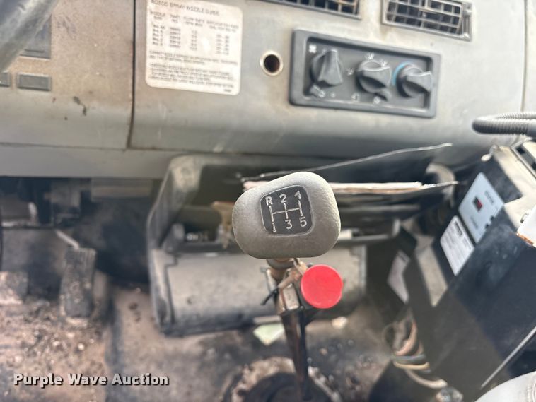 image for item ET7487 1999 Freightliner FL70 oil distributor truck