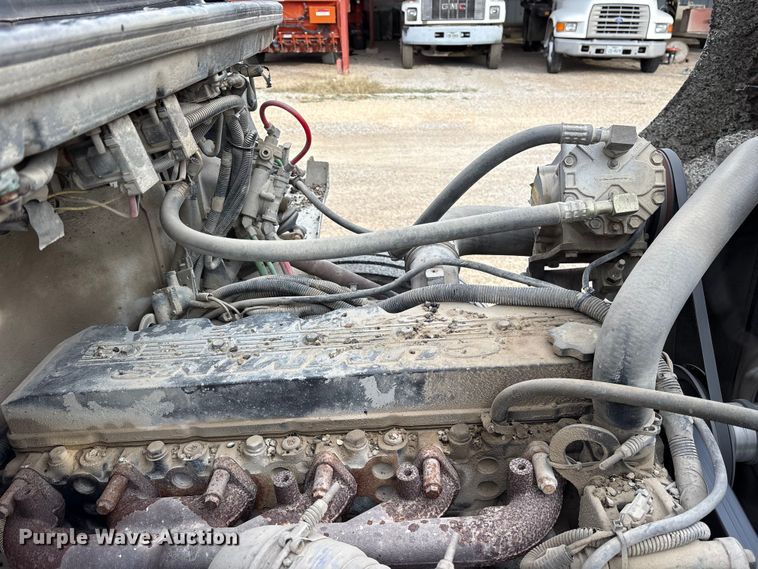 image for item ET7487 1999 Freightliner FL70 oil distributor truck