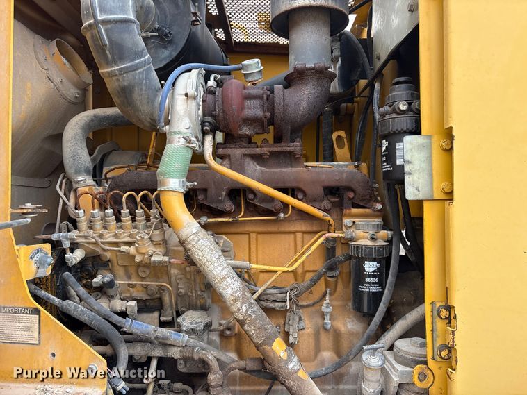 image for item ET7489 1998 John Deere 670CH motor grader