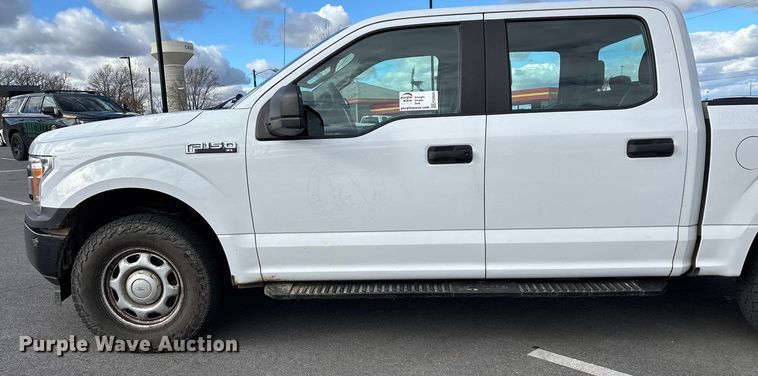 image for item FG0025 2018 Ford F150 Crew Cab flatbed pickup truck