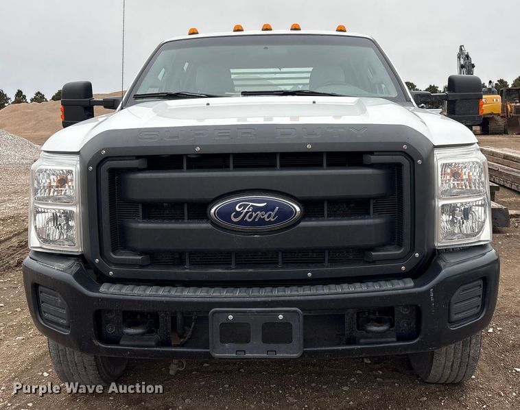 image for item FG2531 2016 Ford F350 Super Duty Ext. Cab flatbed pickup truck