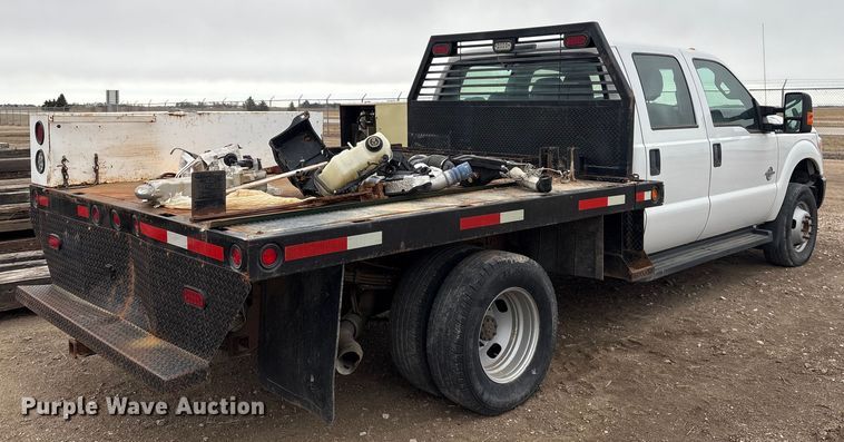 image for item FG2531 2016 Ford F350 Super Duty Ext. Cab flatbed pickup truck