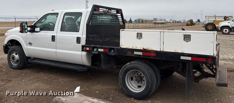 image for item FG2531 2016 Ford F350 Super Duty Ext. Cab flatbed pickup truck
