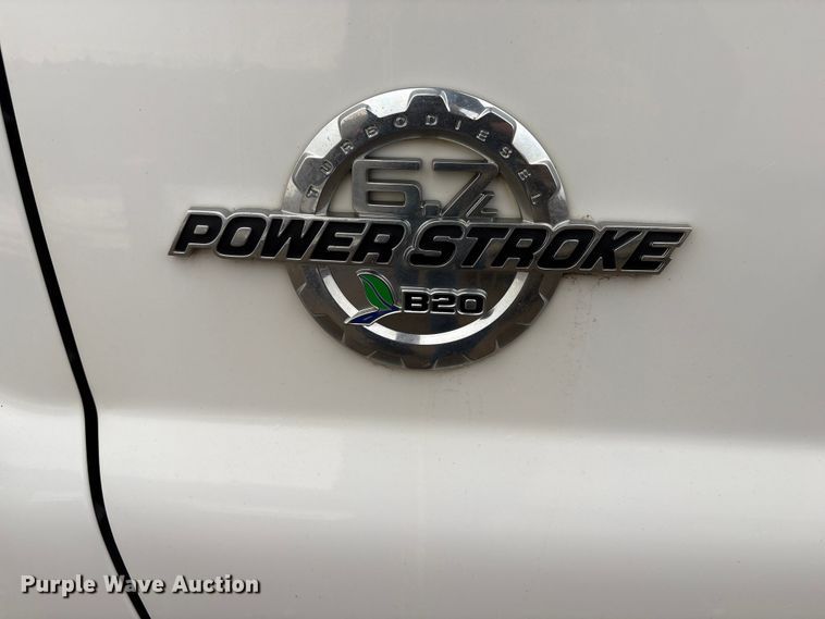 image for item FG2531 2016 Ford F350 Super Duty Ext. Cab flatbed pickup truck