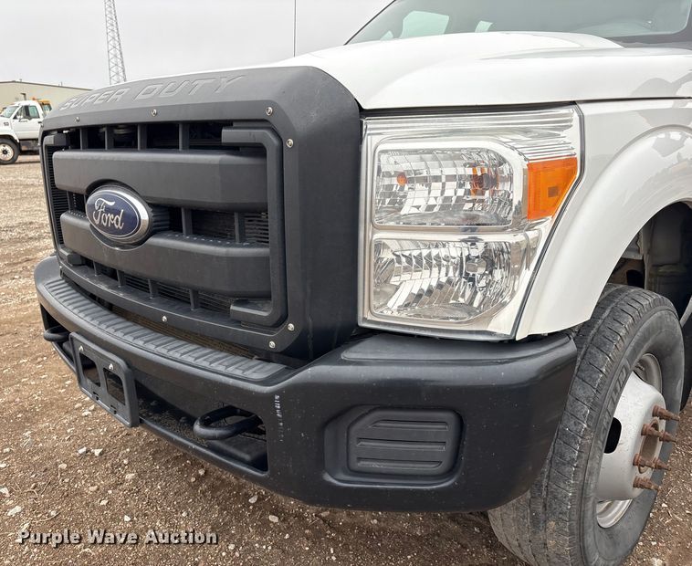 image for item FG2531 2016 Ford F350 Super Duty Ext. Cab flatbed pickup truck