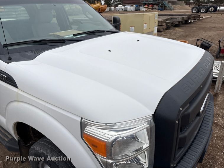 image for item FG2531 2016 Ford F350 Super Duty Ext. Cab flatbed pickup truck