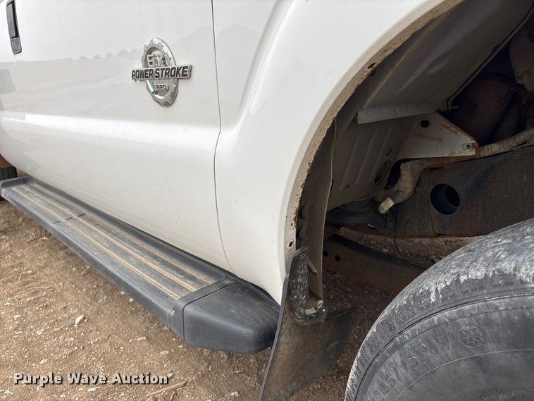 image for item FG2531 2016 Ford F350 Super Duty Ext. Cab flatbed pickup truck