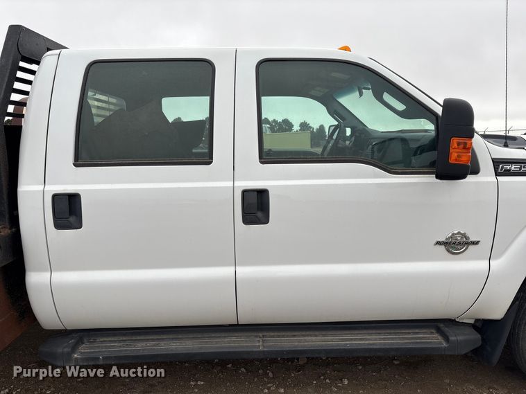 image for item FG2531 2016 Ford F350 Super Duty Ext. Cab flatbed pickup truck