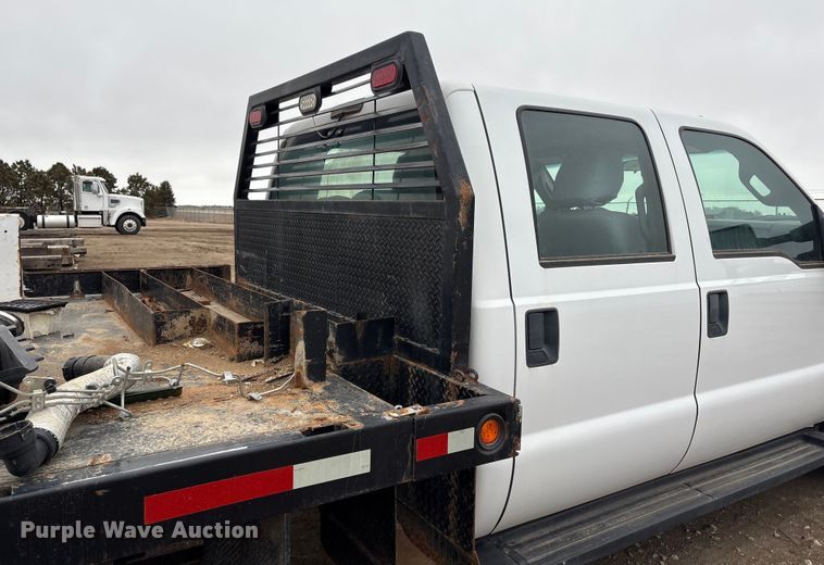 image for item FG2531 2016 Ford F350 Super Duty Ext. Cab flatbed pickup truck