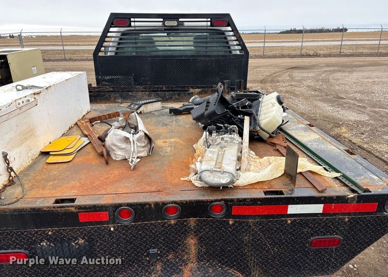 image for item FG2531 2016 Ford F350 Super Duty Ext. Cab flatbed pickup truck