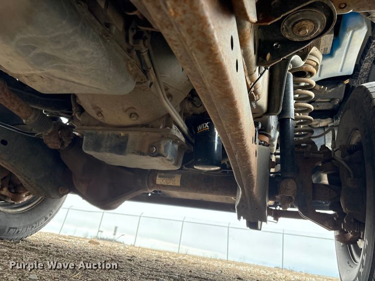 image for item FG2531 2016 Ford F350 Super Duty Ext. Cab flatbed pickup truck