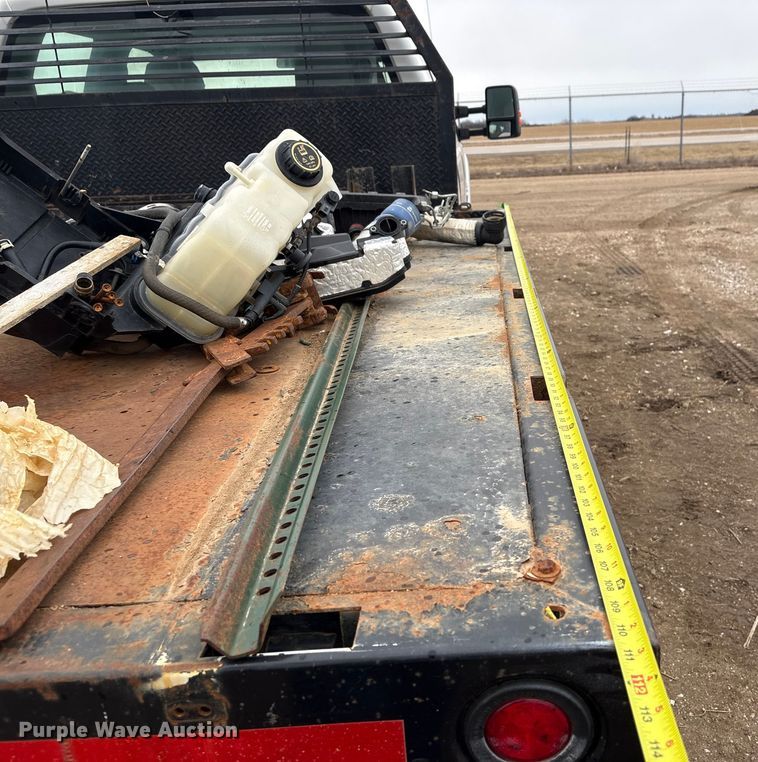 image for item FG2531 2016 Ford F350 Super Duty Ext. Cab flatbed pickup truck