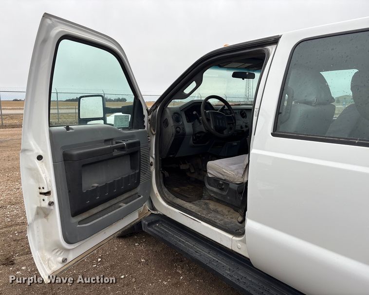 image for item FG2531 2016 Ford F350 Super Duty Ext. Cab flatbed pickup truck