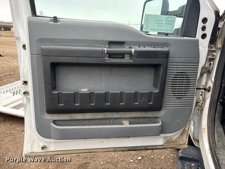 image for item FG2531 2016 Ford F350 Super Duty Ext. Cab flatbed pickup truck