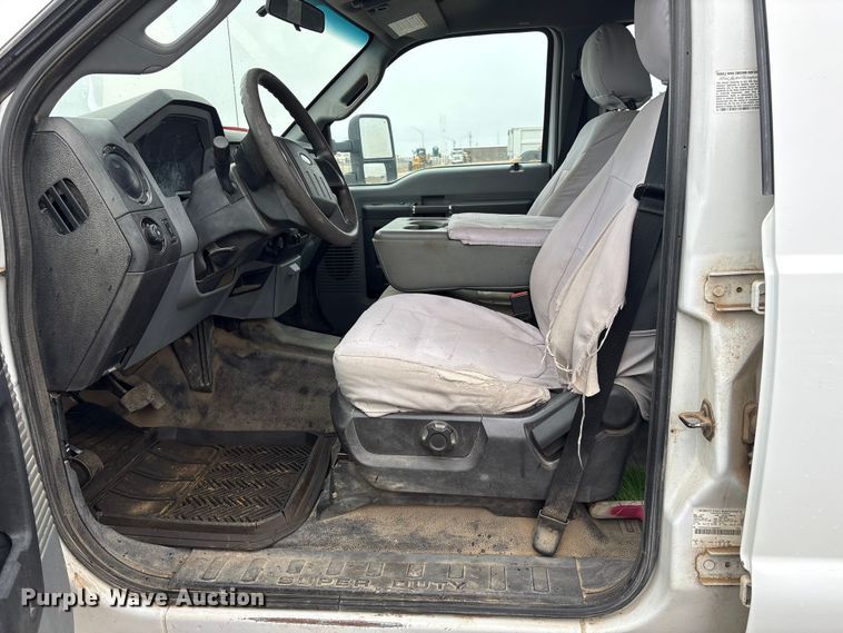 image for item FG2531 2016 Ford F350 Super Duty Ext. Cab flatbed pickup truck