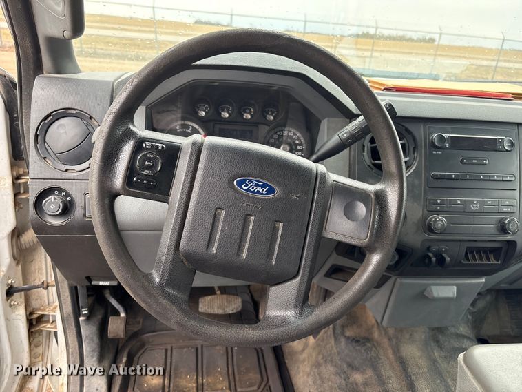 image for item FG2531 2016 Ford F350 Super Duty Ext. Cab flatbed pickup truck