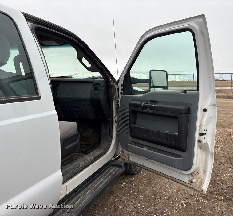 image for item FG2531 2016 Ford F350 Super Duty Ext. Cab flatbed pickup truck