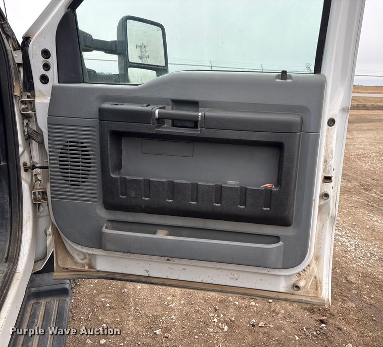 image for item FG2531 2016 Ford F350 Super Duty Ext. Cab flatbed pickup truck