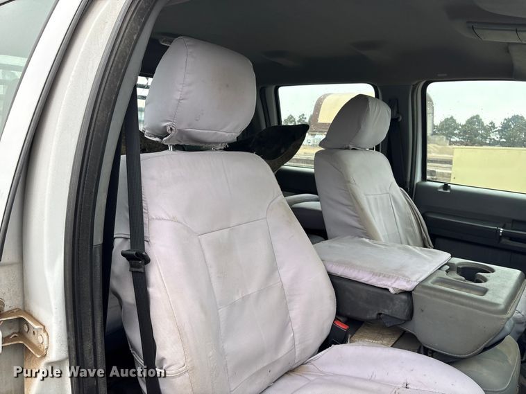 image for item FG2531 2016 Ford F350 Super Duty Ext. Cab flatbed pickup truck