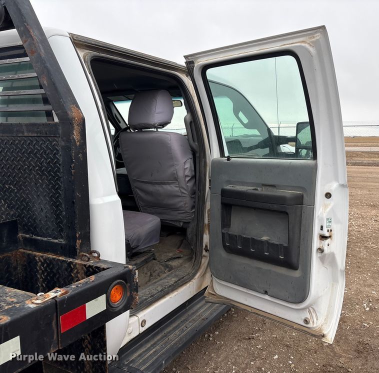 image for item FG2531 2016 Ford F350 Super Duty Ext. Cab flatbed pickup truck