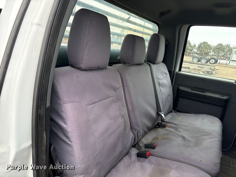 image for item FG2531 2016 Ford F350 Super Duty Ext. Cab flatbed pickup truck