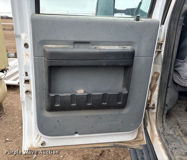 image for item FG2531 2016 Ford F350 Super Duty Ext. Cab flatbed pickup truck