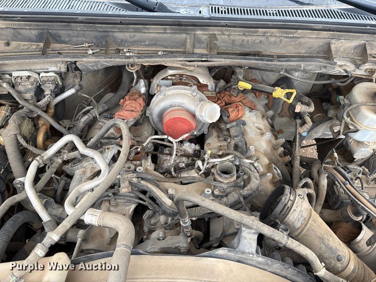 image for item FG2531 2016 Ford F350 Super Duty Ext. Cab flatbed pickup truck