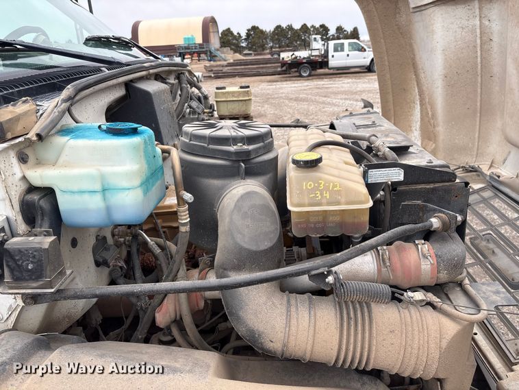 image for item FG2533 2000 GMC C6500 flatbed truck