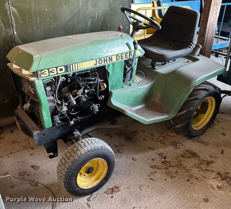 image for item OE9326 John Deere 330 lawn mower