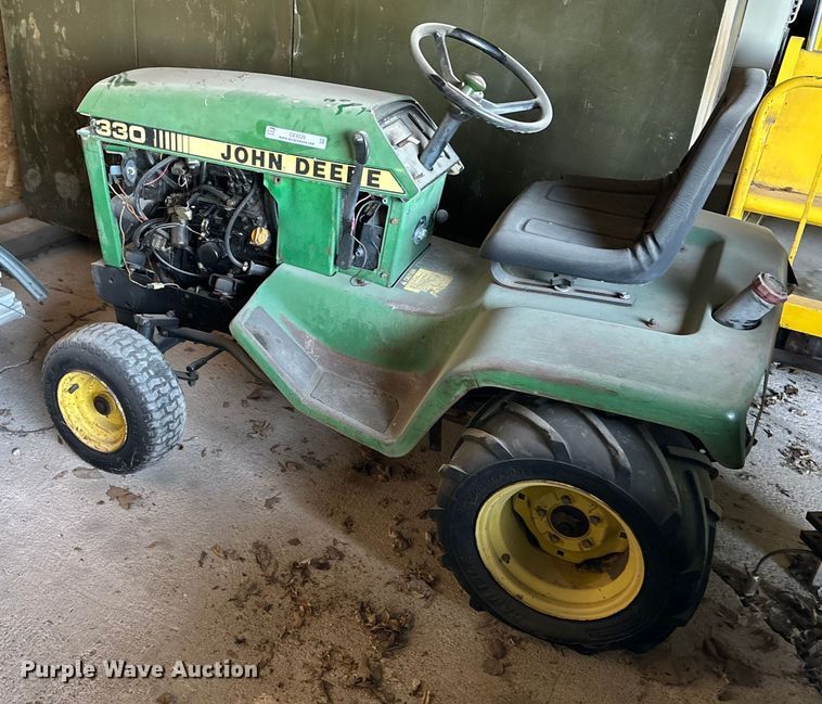 image for item OE9326 John Deere 330 lawn mower