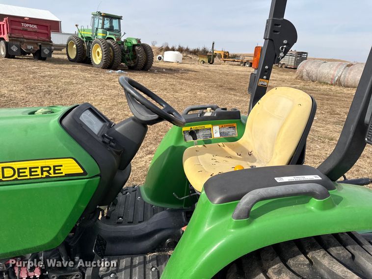 image for item EN0192 2015 John Deere 3038E MFWD tractor