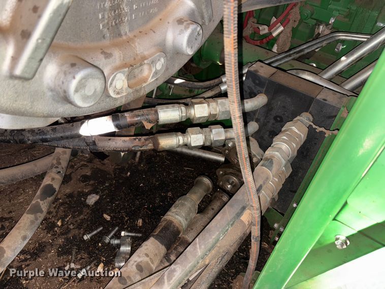 image for item YA1990 2020 John Deere CS690 RWA cotton stripper