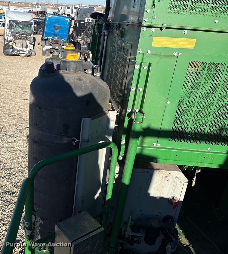 image for item YA1990 2020 John Deere CS690 RWA cotton stripper