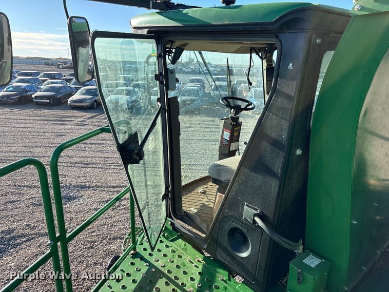 image for item YA1990 2020 John Deere CS690 RWA cotton stripper