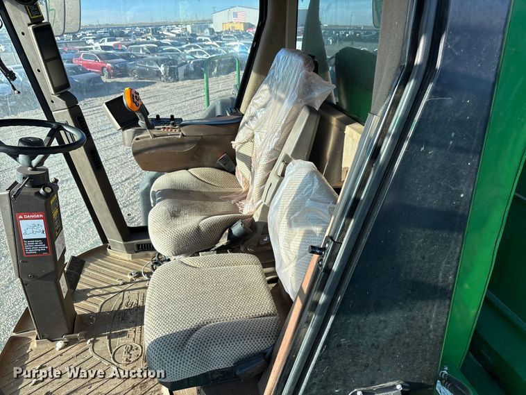 image for item YA1990 2020 John Deere CS690 RWA cotton stripper