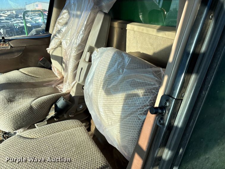 image for item YA1990 2020 John Deere CS690 RWA cotton stripper