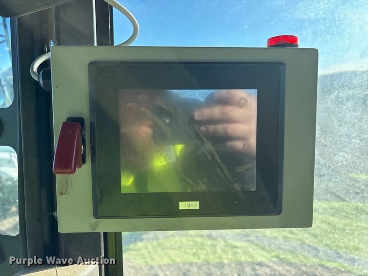 image for item YA1990 2020 John Deere CS690 RWA cotton stripper