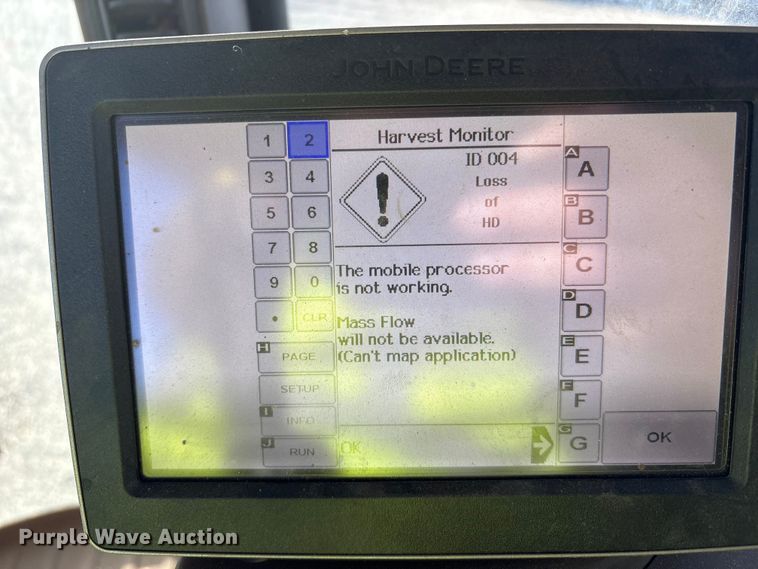 image for item YA1990 2020 John Deere CS690 RWA cotton stripper