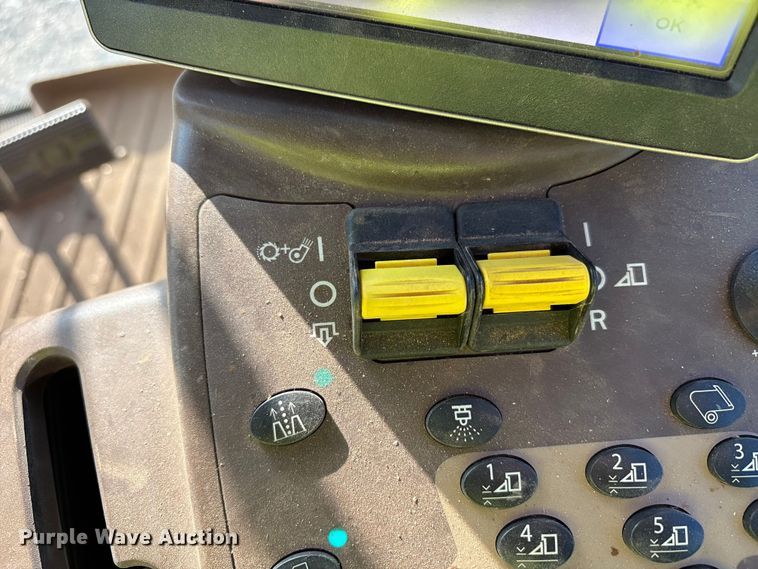 image for item YA1990 2020 John Deere CS690 RWA cotton stripper