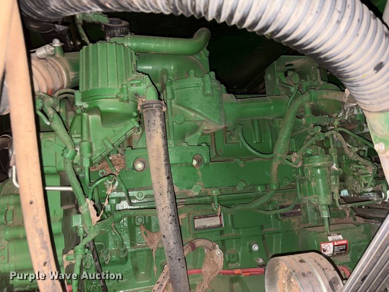 image for item YA1990 2020 John Deere CS690 RWA cotton stripper