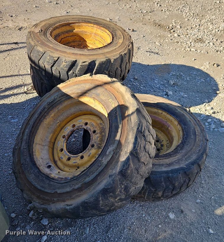 image for item EO4939 (4) 10x16.5 skid steer wheels and tires