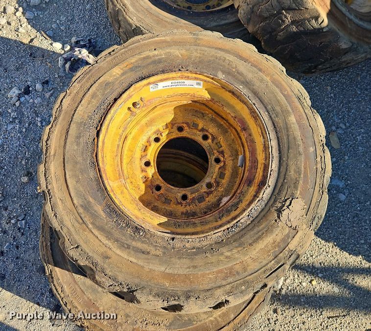 image for item EO4939 (4) 10x16.5 skid steer wheels and tires