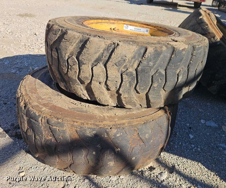 image for item EO4939 (4) 10x16.5 skid steer wheels and tires