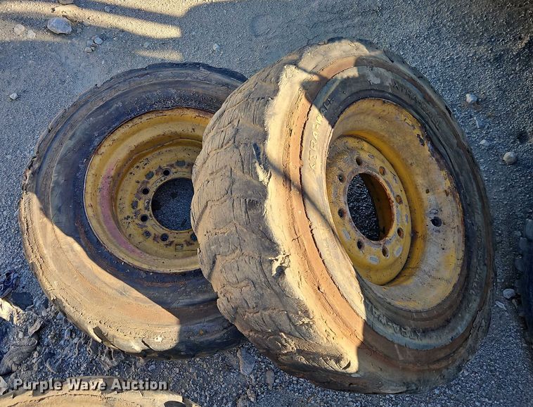 image for item EO4939 (4) 10x16.5 skid steer wheels and tires