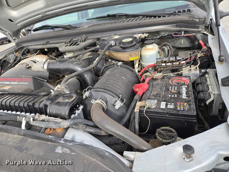 image for item ET1123 2005 Ford F350 Super Duty XL Crew Cab utility bed pickup truck