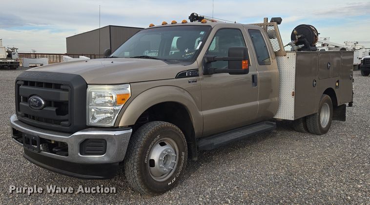 image for item ET1126 2012 Ford F350 Ext. Cab utility bed pickup truck