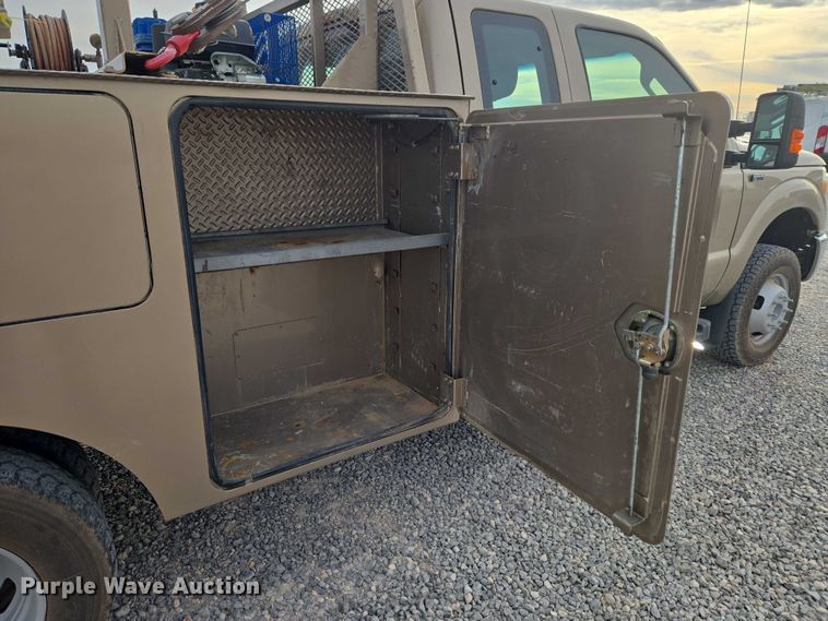 image for item ET1126 2012 Ford F350 Ext. Cab utility bed pickup truck