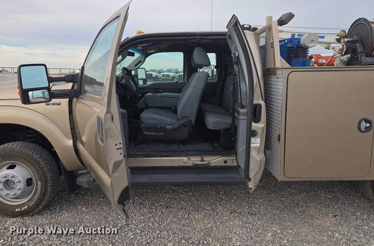 image for item ET1126 2012 Ford F350 Ext. Cab utility bed pickup truck